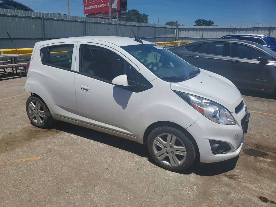 2015 Chevrolet Spark VIN KL8CB6S94FC810558 COPART salvage auction — SIDE, Id - Salvage Certificate Of Title, sold $425 on 2026-07-15 (photo 4)