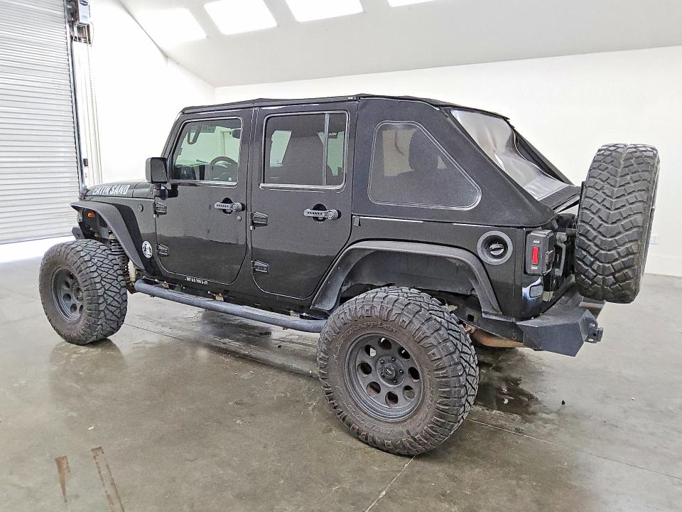2016 Jeep Wrangler unlimited VIN 1C4BJWDG8GL228594 COPART salvage auction — MINOR DENT/SCRATCHES, Tx - Certificate Of Title, sold $3,550 on 2026-07-02 (photo 2)