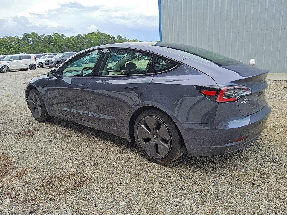 2023 Tesla Model 3 VIN 5YJ3E1EA5PF491330 COPART salvage auction — SIDE, GA - CERTIFICATE OF TITLE (P), sold $7,700 on 2026-07-16 (photo 2)