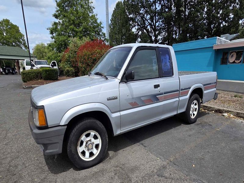 1989 Mazda B2200 VIN JM2UF3135K0720502 COPART salvage auction — MINOR DENT/SCRATCHES, Or - Certificate Of Title (P), sold $1,950 on 2026-07-08 (photo 2)
