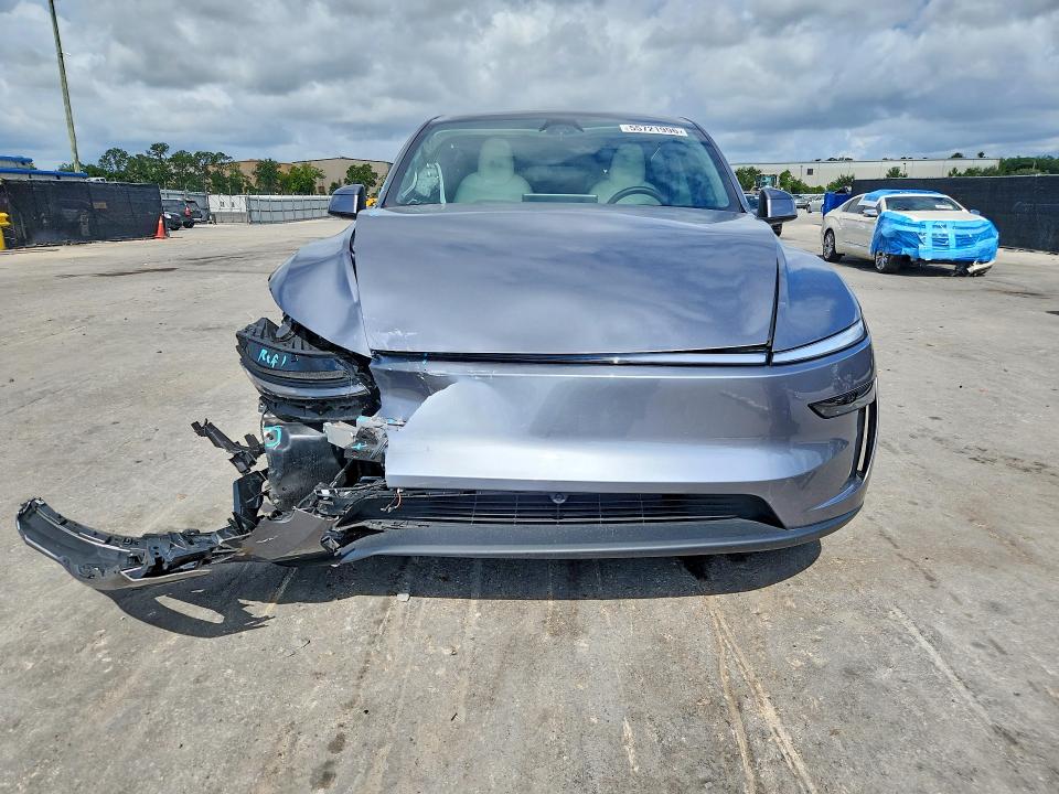 2026 Tesla Model y VIN 7SAYGDEE1TA401122 COPART salvage auction — REAR END, Fl - Cert Of Title Slvg Rebuildable, sold $13,100 on 2026-07-30 (photo 5)
