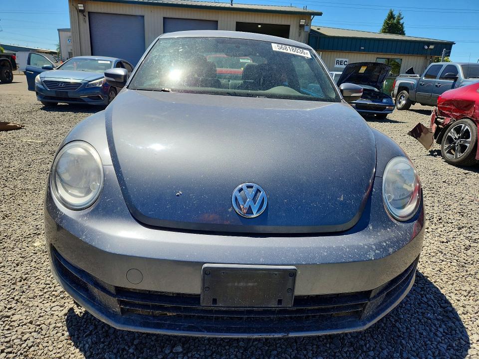 2012 Volkswagen Beetle VIN 3VWJP7AT5CM614980 COPART salvage auction — MINOR DENT/SCRATCHES, Or - Salvage Title Certificate, sold $2,100 on 2026-08-04 (photo 5)