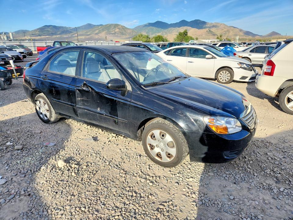 2009 Kia Spectra VIN KNAFE222395593193 COPART salvage auction — SIDE, Ut - Salvage Certificate, sold $700 on 2026-07-10 (photo 4)