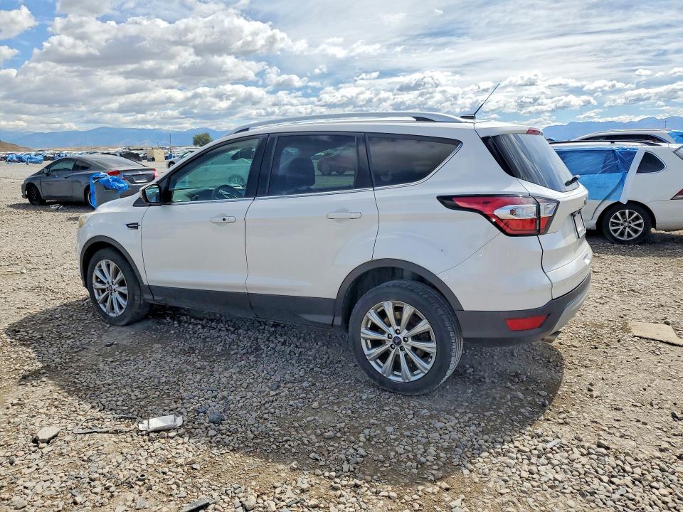 2017 Ford Escape VIN 1FMCU9J97HUE04173 COPART salvage auction — MINOR DENT/SCRATCHES, Ut - Cert Of Title-Rebuilt/Restored, sold $425 on 2026-07-04 (photo 2)