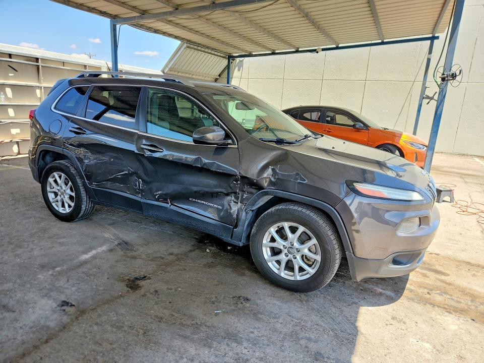 2014 Jeep Cherokee VIN 1C4PJLCB6EW228325 COPART salvage auction — SIDE, Tx - Salvage Vehicle Title, sold $125 on 2026-07-24 (photo 4)