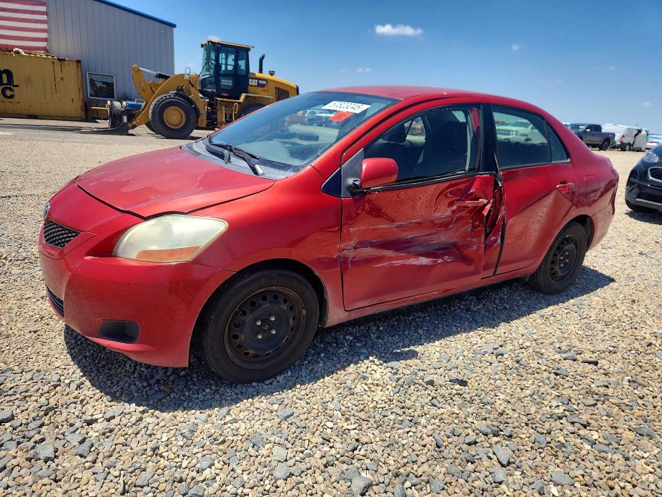 2011 Toyota Yaris VIN JTDBT4K30B1404802 COPART salvage auction — SIDE, Ks - Cert Of Title-Salvage, sold $750 on 2026-07-28 (photo 1)