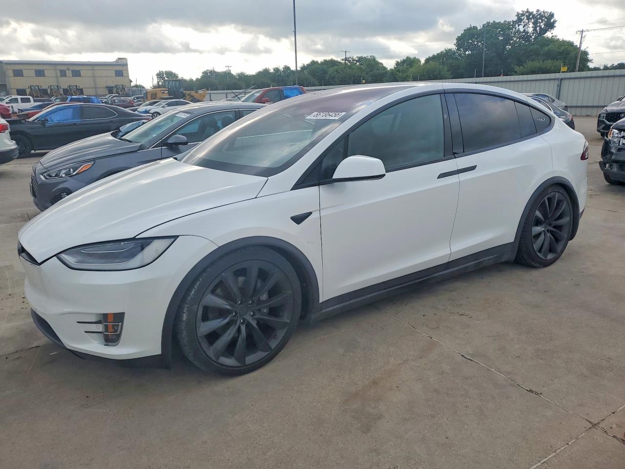 2021 Tesla Model X VIN 5YJXCBE29MF322851 COPART salvage auction — Side, TX - SALVAGE W/LEMON LAW HISTORTY, sold $16,500 on 2026-07-02 (photo 1)