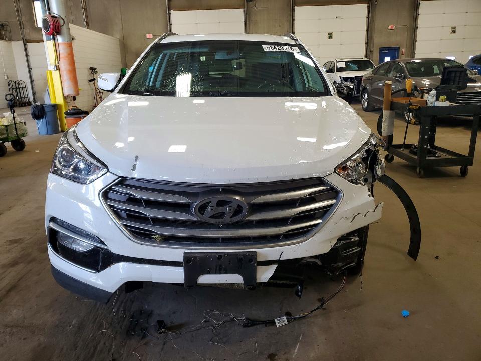 2018 Hyundai Santa fe VIN 5XYZUDLA2JG550156 COPART salvage auction — FRONT END, Mn - Cert Of Title-Salvage, sold $2,000 on 2026-07-07 (photo 5)