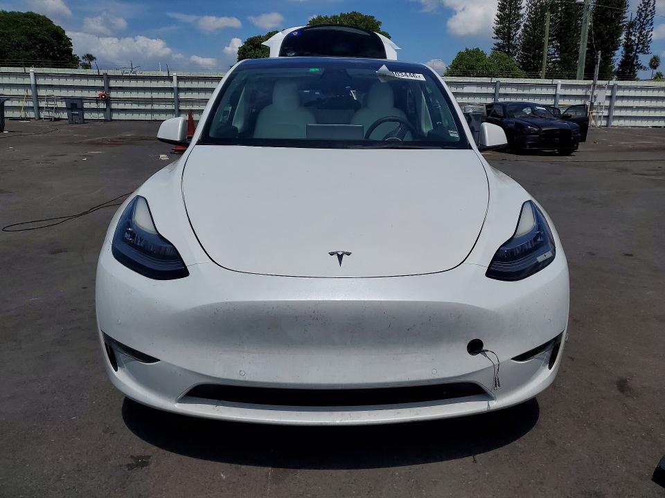 2022 Tesla Model y VIN 7SAYGAEE8NF390270 COPART salvage auction — REAR END, Fl - Cert Of Title Slvg Rebuildable, sold $9,900 on 2026-08-03 (photo 5)