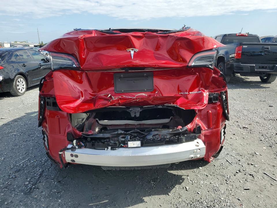 2025 Tesla Model y VIN 7SAYGDEE6SA352627 COPART salvage auction — REAR END, Fl - Cert Of Title Slvg Rebuildable, sold $14,300 on 2026-07-06 (photo 6)