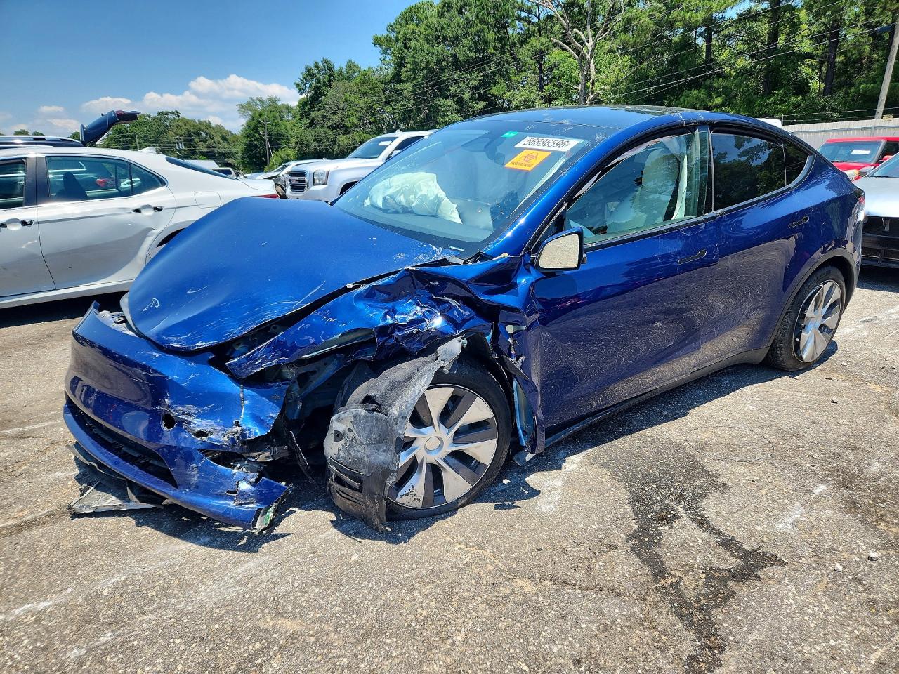 2024 Tesla Model Y VIN 7SAYGDEE4RA236031 — COPART salvage auction photo