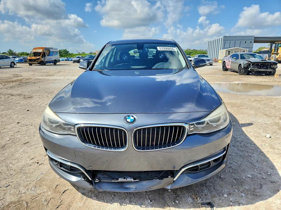 2015 BMW 3er VIN WBA3X5C55FD562777 COPART salvage auction — MINOR DENT/SCRATCHES, FL - CERTIFICATE OF TITLE, sold $2,500 on 2026-07-28 (photo 5)