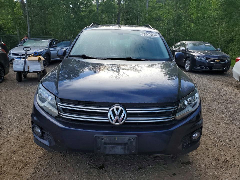 2016 Volkswagen Tiguan VIN WVGJV7AX2GW574614 COPART salvage auction — SIDE, On - Permit No Brand - Unfit, sold $1,300 on 2026-07-07 (photo 5)