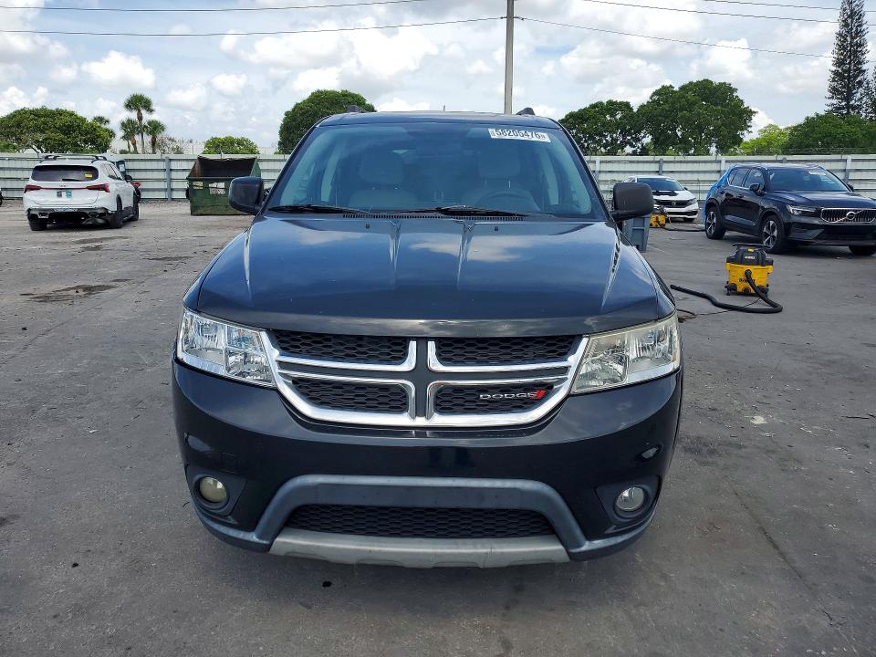 2014 Dodge VIN 3C4PDCBG3ET129097 COPART salvage auction — MINOR DENT/SCRATCHES, Fl - Certificate Of Title, sold $1,250 on 2026-07-03 (photo 5)