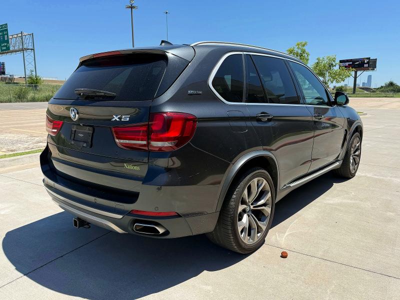 2018 BMW X5 VIN 5UXKT0C54J0W02939 COPART salvage auction — MINOR DENT/SCRATCHES, Ok - Certificate Of Title (P), sold $7,200 on 2026-07-02 (photo 4)