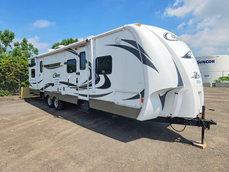 2012 Keystone rv Cougar VIN 4YDT31S29CV501238 COPART salvage auction — WATER/FLOOD, QC - IRRECUPERABLE, sold $625 on 2026-09-15 (photo 9)