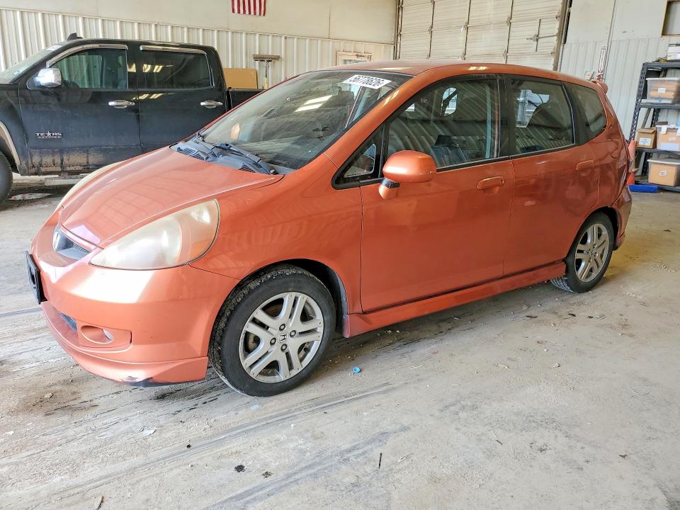 2007 Honda Fit VIN JHMGD38687S068539 COPART salvage auction — WATER/FLOOD, Tx - Salvage Title-Flood Damage, sold $550 on 2026-07-17 (photo 1)