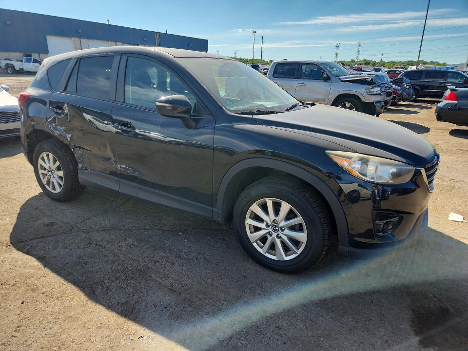 2016 Mazda Cx-5 VIN JM3KE4CY4G0770156 COPART salvage auction — SIDE, MI - DEALER ONLY CLEAN TITLE, sold $1,700 on 2026-07-02 (photo 4)