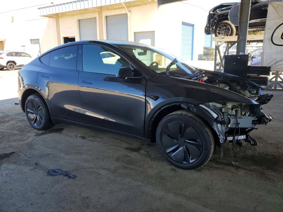 2026 Tesla Model y VIN 7SAYGDED6TF583409 COPART salvage auction — FRONT END, Ca - Salvage Certificate, sold $16,200 on 2026-07-14 (photo 4)