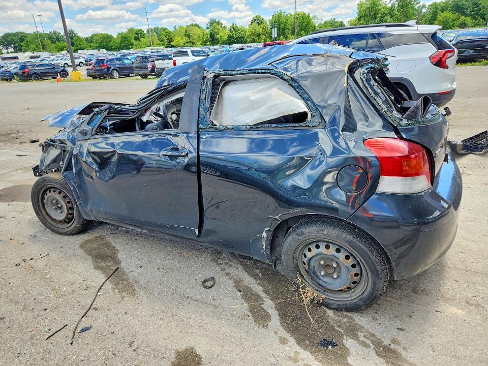 2009 Toyota Yaris VIN JTDJT903295233856 COPART salvage auction — ALL OVER, IN - CERT OF TITLE-SALVAGE TITLE (P), sold $225 on 2026-07-27 (photo 2)