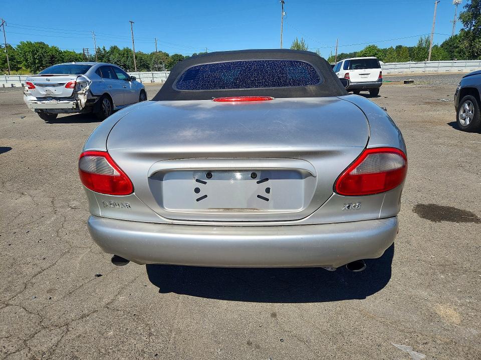 1999 Jaguar Xk series VIN SAJGX2049XC041200 COPART salvage auction — REAR END, Wa - Vehicle Cert Of Ownership-Titl, sold $1,750 on 2026-07-22 (photo 6)