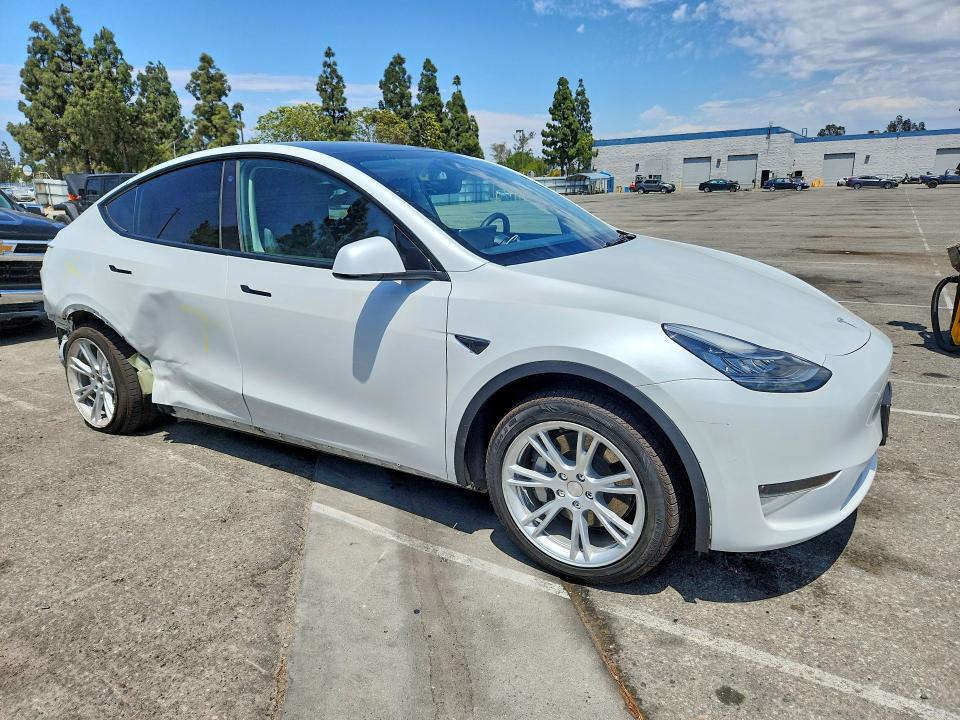 2023 Tesla VIN 7SAYGDEE8PA125107 COPART salvage auction — REAR END, CA - SALVAGE CERTIFICATE, sold $6,700 on 2026-07-28 (photo 4)