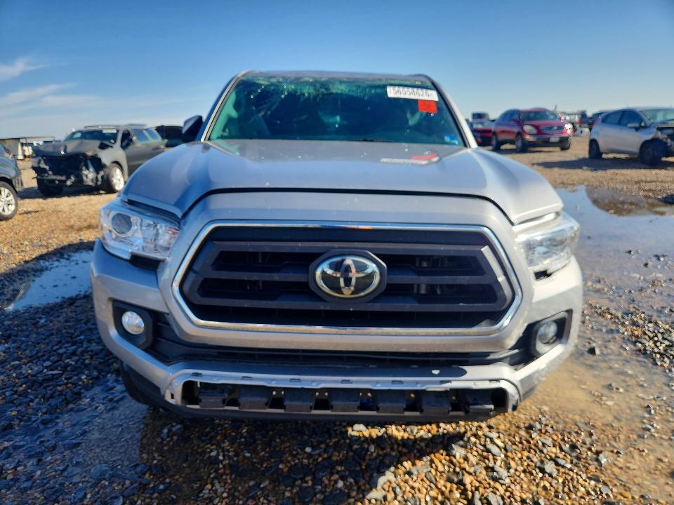 2021 Toyota Tacoma VIN 5TFAZ5CN2MX100113 COPART salvage auction — ROLLOVER, Tx - Salvage Vehicle Title, sold $8,100 on 2026-07-14 (photo 5)