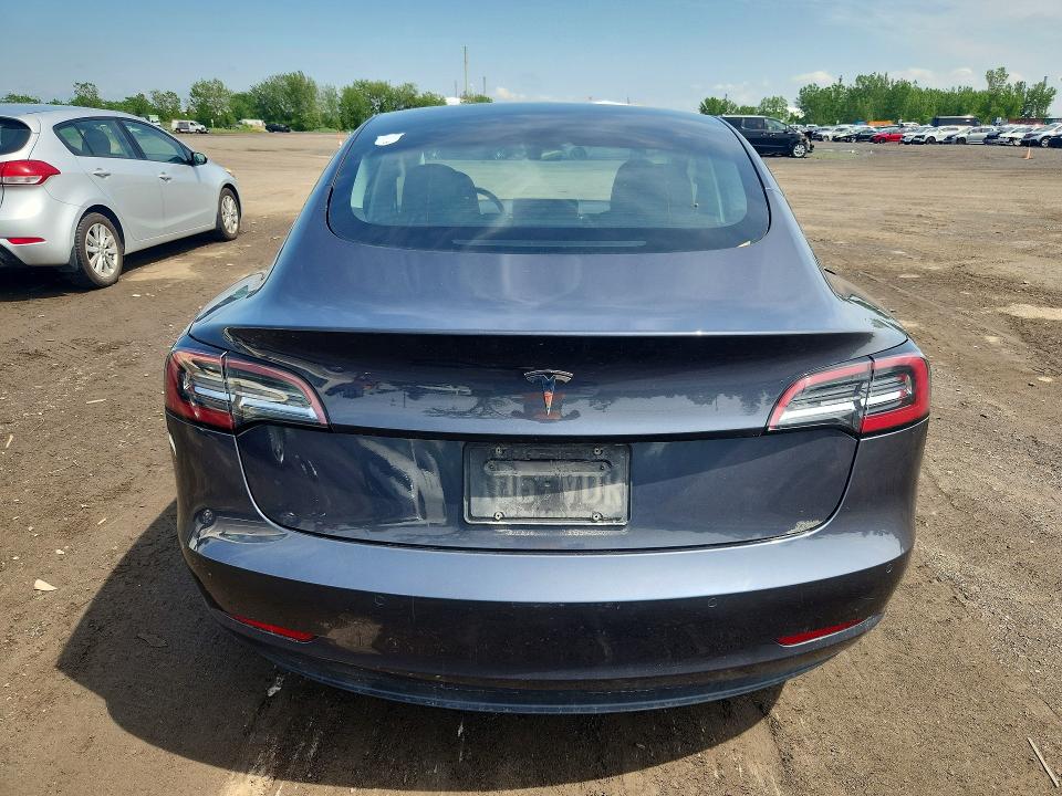 2021 Tesla Model 3 VIN 5YJ3E1EA1MF981582 COPART salvage auction — SIDE, Qc - Aucune Mention, sold $8,800 on 2026-07-07 (photo 6)
