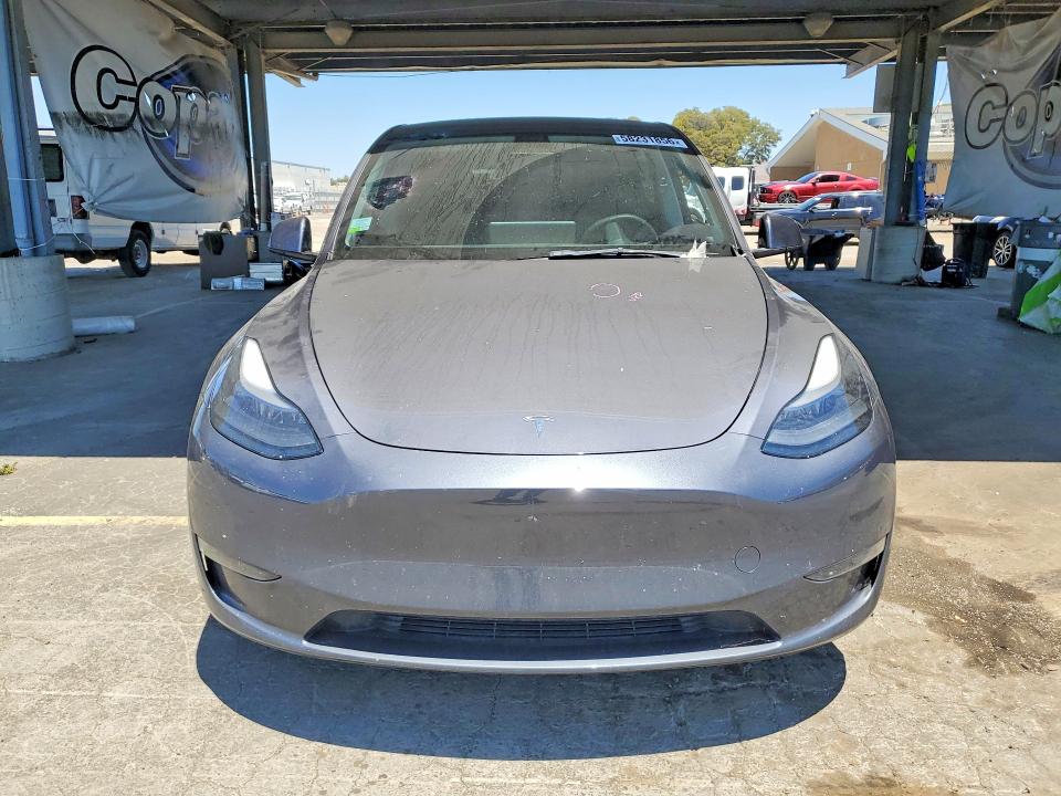2023 Tesla Model y VIN 7SAYGDEE2PF625377 COPART salvage auction — REAR END, Ca - Salvage Certificate, sold $7,700 on 2026-07-07 (photo 5)