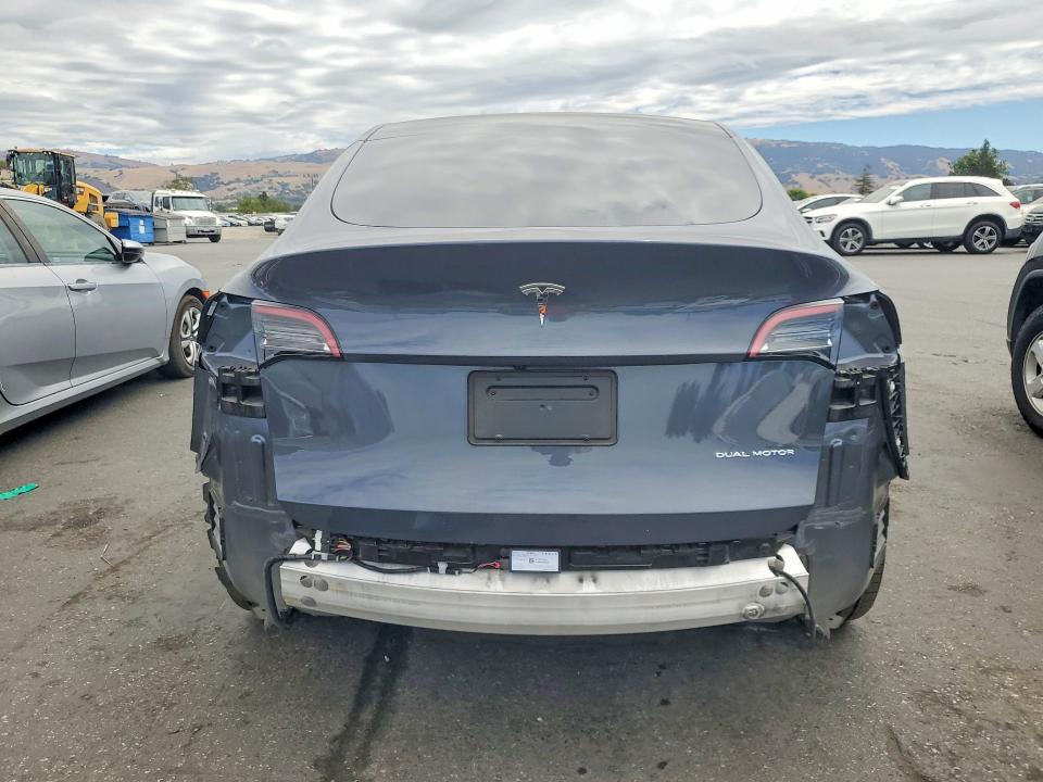2022 Tesla Model y VIN 7SAYGDEE3NF537127 COPART salvage auction — REAR END, Ca - Salvage Certificate, sold $12,700 on 2026-07-16 (photo 6)