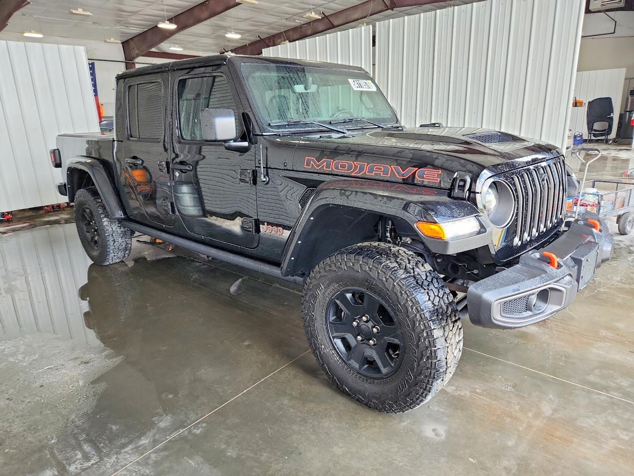 2022 Jeep Gladiator VIN 1C6JJTEG5NL143967 COPART salvage auction — Minor Dent/Scratches, IL - CERTIFICATE OF TITLE, sold $26,500 on 2026-07-09 (photo 4)