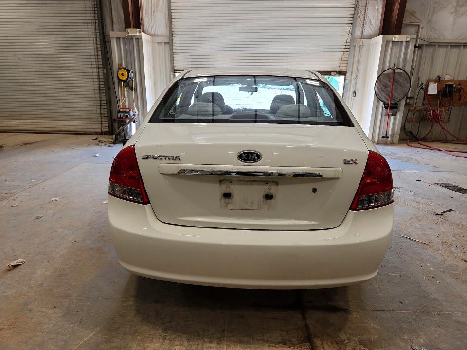 2009 Kia Spectra VIN KNAFE221795613517 COPART salvage auction — HAIL, Wi - Certificate Of Title, sold $275 on 2026-07-08 (photo 6)