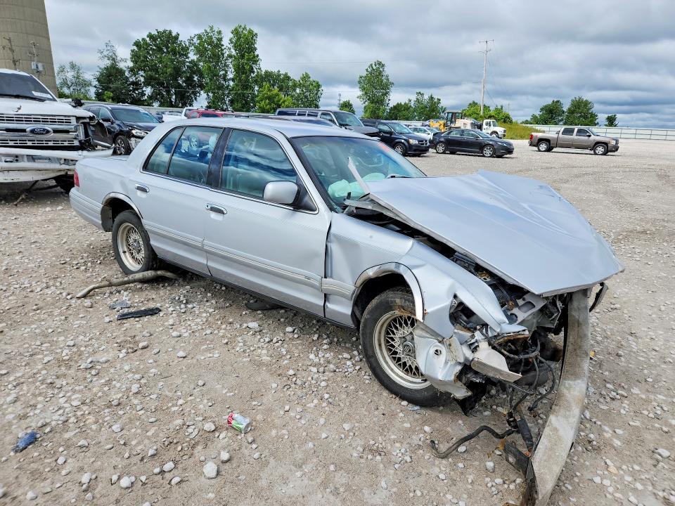 1997 Mercury Grand marquis VIN 2MELM75W4VX673422 COPART salvage auction — FRONT END, MI - CERTIFICATE OF TITLE, sold $175 on 2026-07-23 (photo 4)