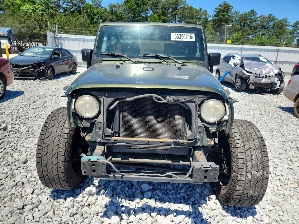 2009 Jeep Wrangler / VIN 1J4GB39179L753990 COPART salvage auction — FRONT END, GA - CERT OF TITLE-SALVAGE, sold $1,500 on 2026-08-02 (photo 5)