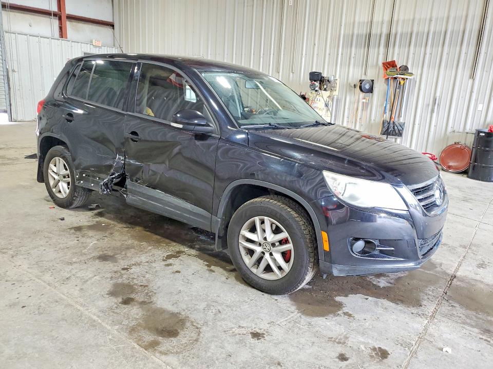 2011 Volkswagen Tiguan VIN WVGBV7AX1BW527975 COPART salvage auction — SIDE, NY - MV-907A SALVAGE CERTIFICATE, sold $400 on 2026-07-20 (photo 4)