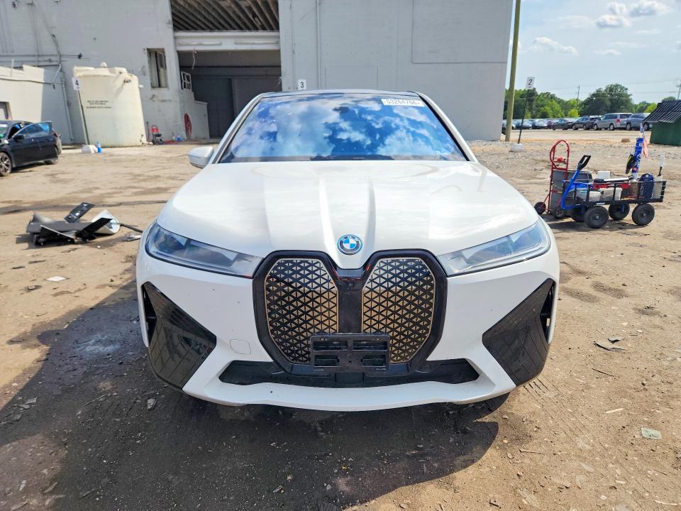 2024 BMW Ix VIN WB523CF0XRCN55473 COPART salvage auction — SIDE, Va - Cert Of Title - Salvage, sold $20,900 on 2026-07-15 (photo 5)