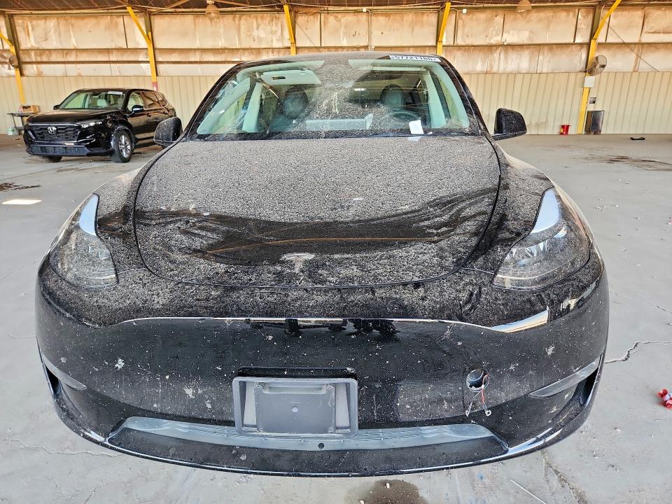 2023 Tesla Model y VIN 7SAYGDEE0PF920459 COPART salvage auction — REAR END, Salvage Title, sold $15,351 on 2026-07-18 (photo 5)