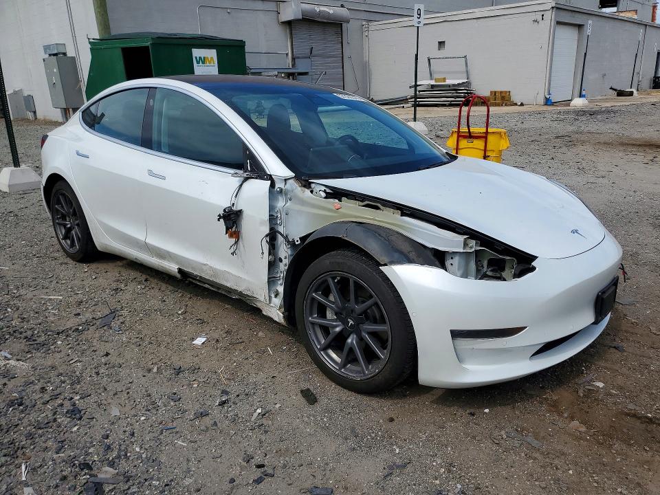 2018 Tesla Model 3 VIN 5YJ3E1EB0JF185667 COPART salvage auction — SIDE, VA - CERT OF TITLE - SALVAGE, sold $6,700 on 2026-07-29 (photo 4)