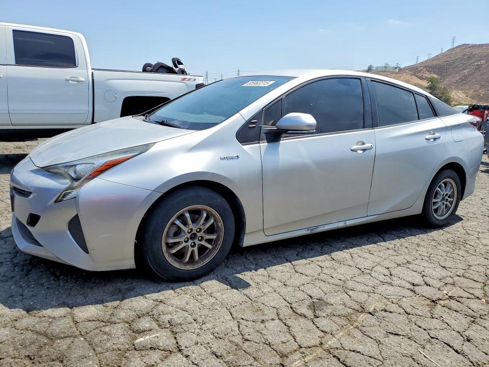 2017 Toyota Prius VIN JTDKBRFUXH3032398 COPART salvage auction — SIDE, Tx - Dis/Dlr/Exp Only Clean Title, sold $5,500 on 2026-07-13 (photo 1)