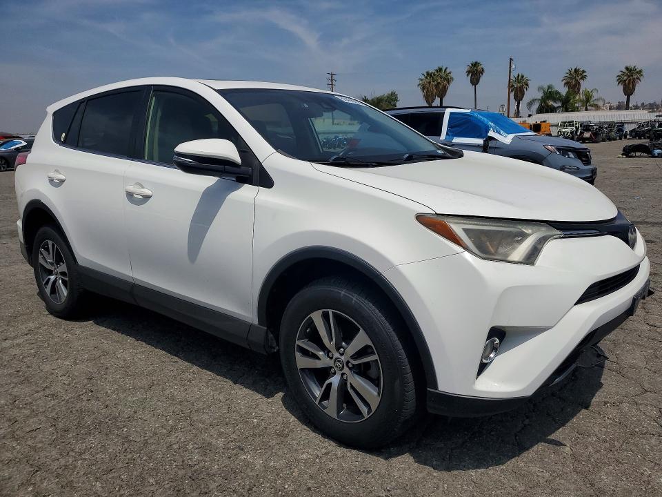 2018 Toyota Rav 4 VIN JTMWFREV1JJ730819 COPART salvage auction — MINOR DENT/SCRATCHES, Ca - Salvage Certificate, sold $7,700 on 2026-07-02 (photo 5)