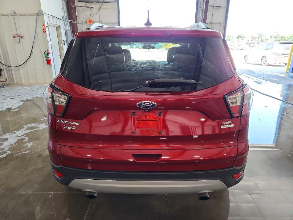 2018 Ford VIN 1FMCU0HD7JUB83525 COPART salvage auction — HAIL, Il - Salvage Certificate, sold $1,800 on 2026-07-27 (photo 6)