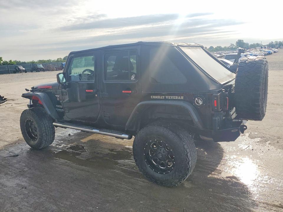 2014 Jeep Wrangler unlimited VIN 1C4BJWDG8EL120036 COPART salvage auction — ALL OVER, Mo - Salvage Certificate Of Title, sold $50 on 2026-08-10 (photo 2)