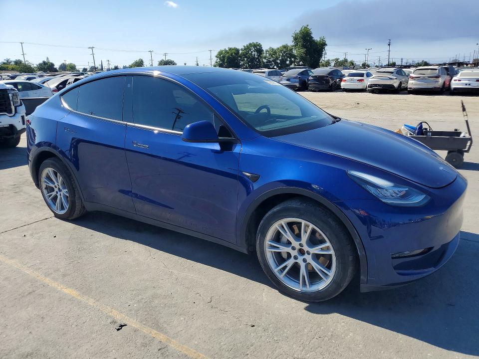 2023 Tesla Model y VIN 7SAYGDEE6PA041108 COPART salvage auction — REAR END, Ca - Salvage Certificate, sold $15,100 on 2026-07-29 (photo 4)