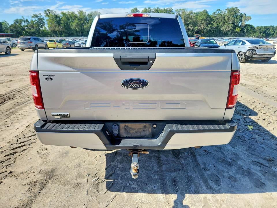 2019 Ford F-150 lightning VIN 1FTEW1E56KKC31202 COPART salvage auction — FRONT END, OK - CERTIFICATE OF TITLE, sold $9,400 on 2026-09-09 (photo 6)