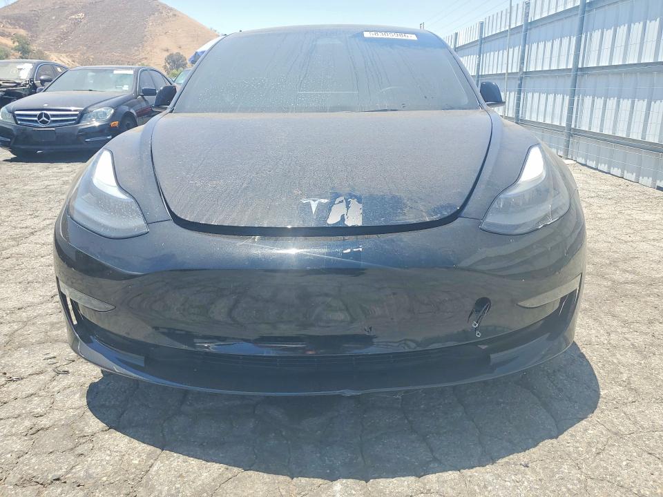 2023 Tesla Model 3 VIN 5YJ3E1EA4PF655229 COPART salvage auction — Burn Interior, Ca - Salvage Certificate, sold $7,000 on 2026-07-20 (photo 5)