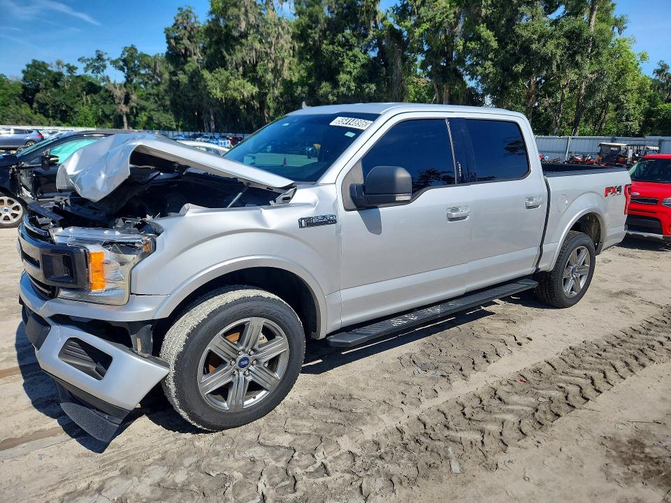 2019 Ford F-150 lightning VIN 1FTEW1E56KKC31202 — COPART salvage auction photo