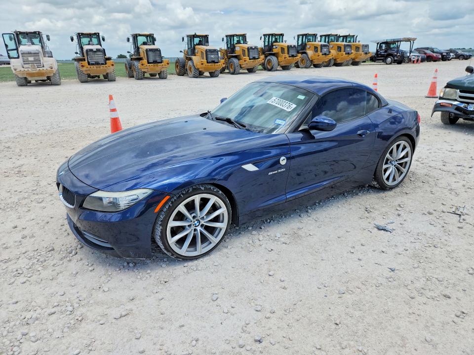 2011 BMW Z4 VIN WBALM7C50BE383930 — COPART salvage auction photo
