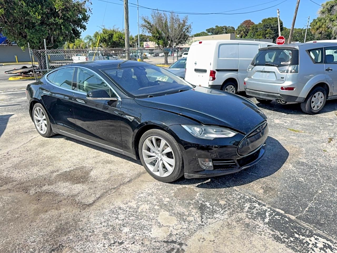 2014 Tesla Model S VIN 5YJSA1H1XEFP66125 COPART salvage auction — Normal Wear, FL - CERTIFICATE OF TITLE (P), sold $3,200 on 2026-07-01 (photo 1)