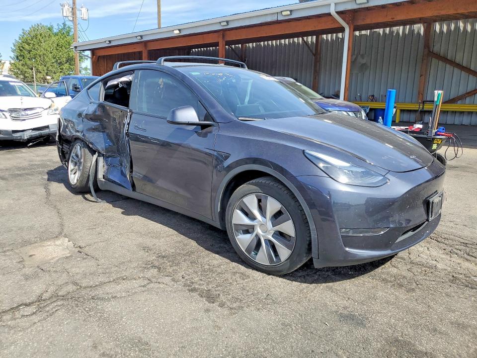 2024 Tesla VIN 7SAYGAEE8RF035542 COPART salvage auction — SIDE, Co - Public - Salvage Title, sold $11,000 on 2026-07-07 (photo 4)