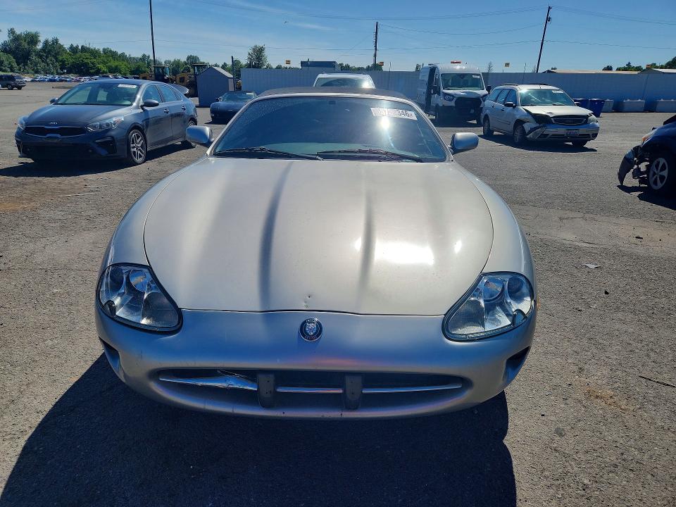 1999 Jaguar Xk series VIN SAJGX2049XC041200 COPART salvage auction — REAR END, Wa - Vehicle Cert Of Ownership-Titl, sold $1,750 on 2026-07-22 (photo 5)